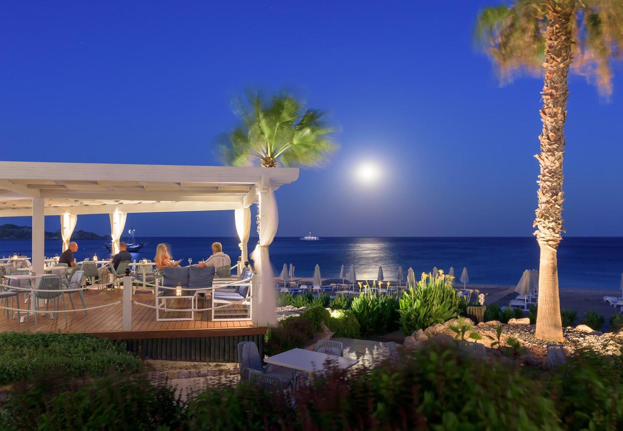 Rodos Palladium Leisure & Wellness Kallithea  Exterior photo Beach bar at night